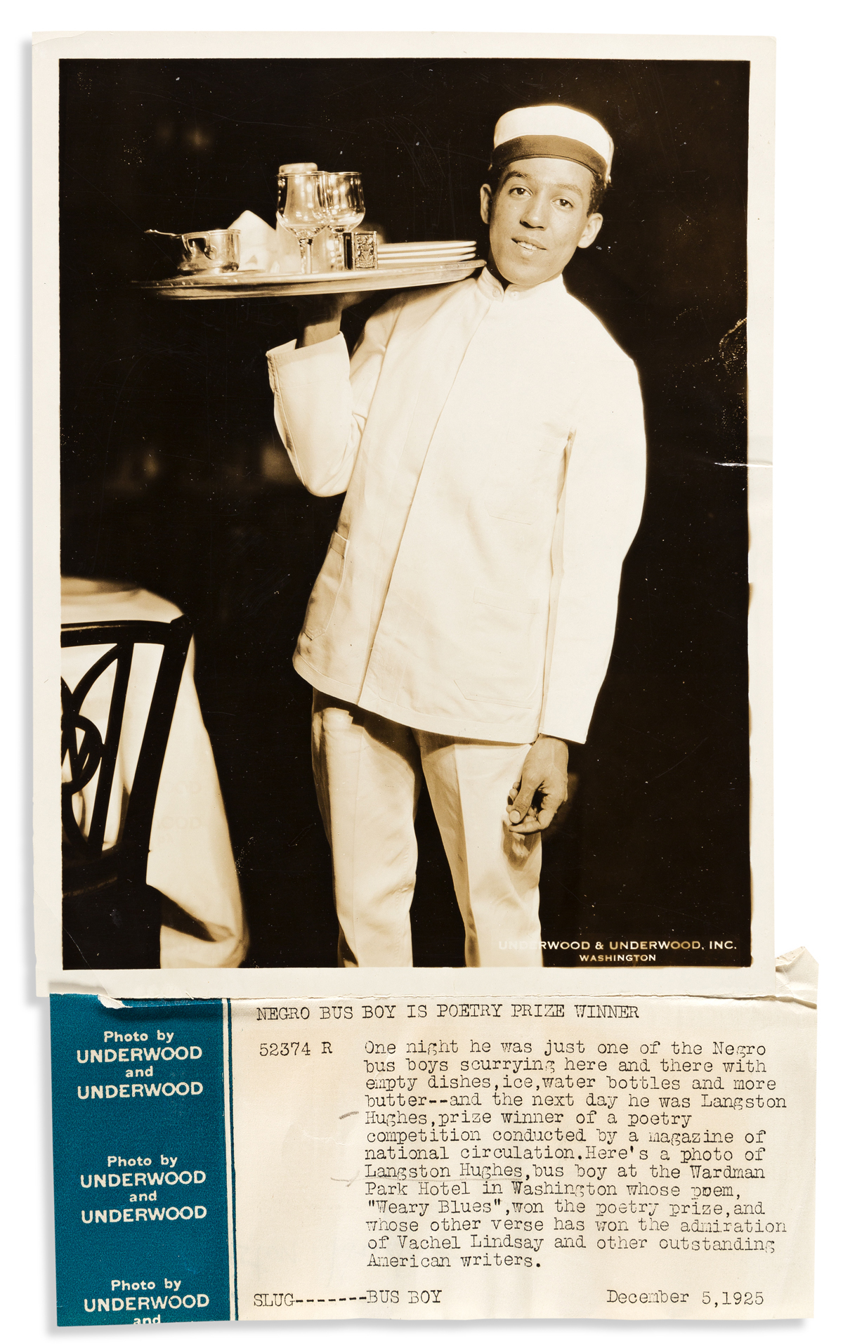 (LITERATURE.) Press photograph of young Langston Hughes as a busboy.